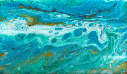 Blue, green and gold marbling pattern. Golden powder marble liquid texture.