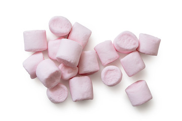 Many pink mini marshmallows isolated on white from above. - obrazy, fototapety, plakaty