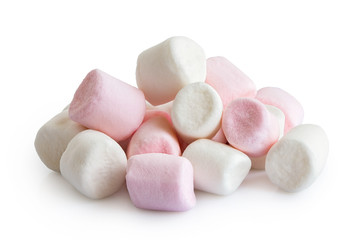 Pile of pink and white mini marshmallows isolated on white. - obrazy, fototapety, plakaty