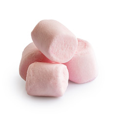 Pile of four pink mini marshmallows isolated on white.