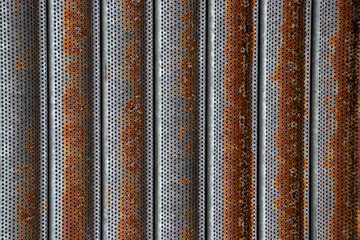 Rusty corrugated metal shutter texture background