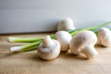 mushrooms on a wooden board