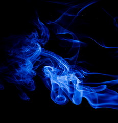 Obraz premium Blue smoke on black background