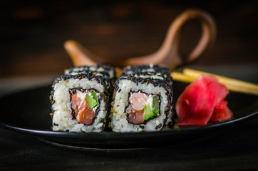 sushi rolls in black sesame