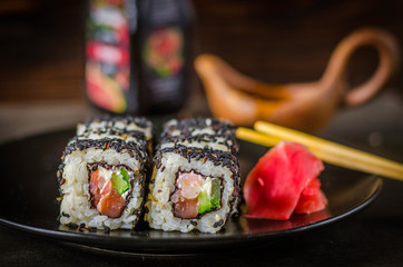 sushi rolls in black sesame