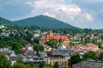 Fototapeta na wymiar Panoramic view of Baden-Baden city center and the hills