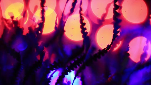 Extreme Close Up Of Purple Metal Shavings On Red Background.