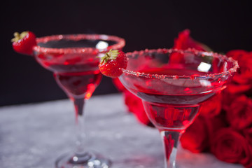 Red exotic alcoholic cocktail in clear glasses
