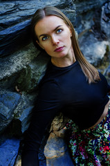 Beautiful young woman resting in the park