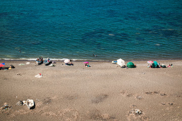 Fototapeta na wymiar beach with umbrellas and sunbeds