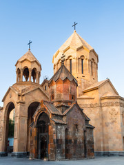 Fototapeta premium Katoghike and Saint Anna Armenian churches located in the Kentron District of Yerevan, the capital of Armenia, illuminated by the evening sun.