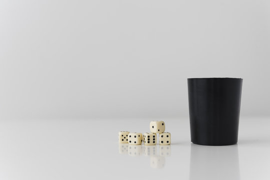 Close-up yahtzee game on white table