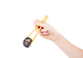 Black sushi with chopsticks in hand on white background