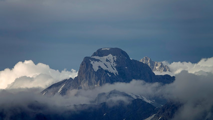 Obraz premium beautiful view on a foggy morning in the alps