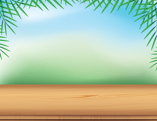 Empty wooden table with palm leaf on blurred nature background.