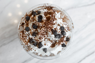 Top view whipping cream with chocolate in the cup.