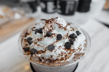 Top view whipping cream with chocolate in the cup.
