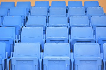 rows of empty seats in stadium