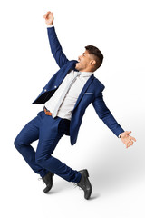 Excited Latin Businessman Dancing Over White Studio Background