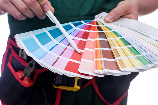 Colour swatch in male hands close up
