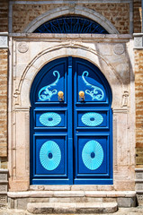 Traditional blue doors of the white and blue city. Sidi Bou Said. Tunisia.
