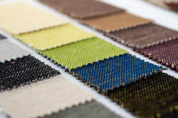 Catalog of multicolored cloth from matting fabric texture background, silk fabric texture, textile industry background. 