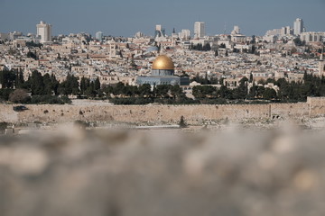 Fototapeta na wymiar Jerusalem city with a dome of mosque with golden roof