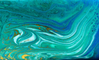 Blue, green and gold marbling pattern. Golden powder marble liquid texture.