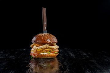 Gourmet craft bacon cheeseburger with tomatoes and onion rings-2.