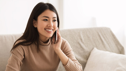 Conversation with Friend. Girl Talking on Phone at Home