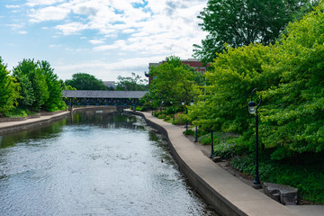 Covered Bridge in the Distance along the Naperville Riverwalk in Downtown Naperville