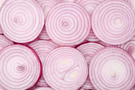 Onion slices as a background. Top view.