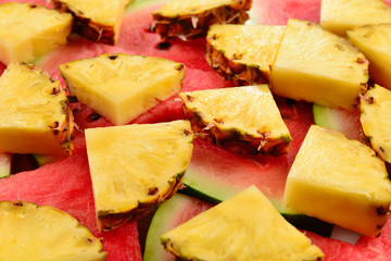 Pineapple and watermelon slices background.