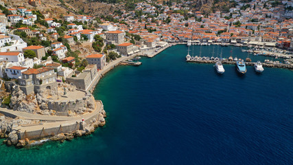 Aerial drone panoramic photo of picturesque port and main village of Hydra or Ydra island with beautiful neoclassic houses, Saronic gulf, Greece
