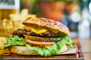 a delicious cheeseburger on the table