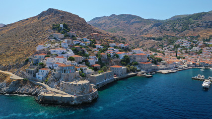 Aerial drone photo of picturesque port and main village of Hydra or Ydra island with beautiful neoclassic houses, Saronic gulf, Greece