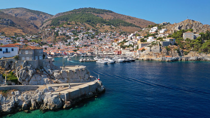 Fototapeta na wymiar Aerial drone photo of picturesque port and main village of Hydra or Ydra island with beautiful neoclassic houses, Saronic gulf, Greece