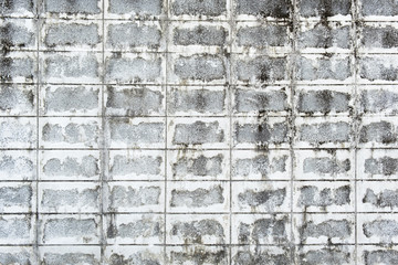 Urban background, white ruined industrial concrete brick wall .