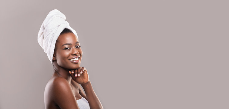 Positive african american woman enjoying spa procedures