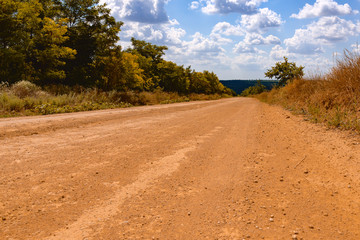 Summer landscape. Country road going to the horizon