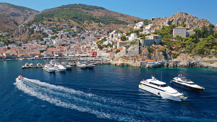 Fototapeta premium Aerial drone photo of picturesque port and main village of Hydra or Ydra island with beautiful neoclassic houses, Saronic gulf, Greece