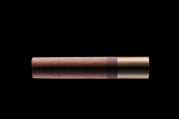Cigar with reflection isolated on black background
