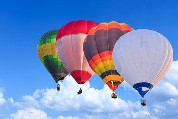 Fototapeta premium Colorful Hot Air Balloons in Flight over blue sky