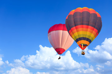 Colorful Hot Air Balloons in Flight over blue sky