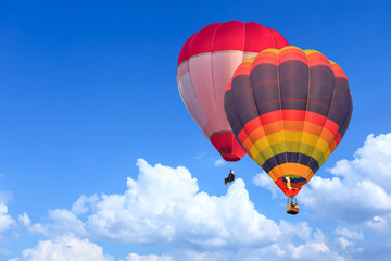 Naklejka premium Colorful Hot Air Balloons in Flight over blue sky