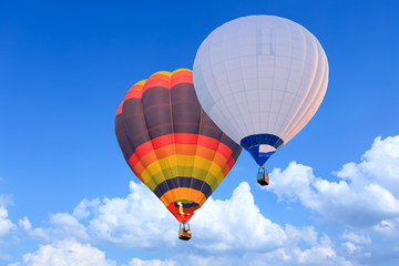 Colorful Hot Air Balloons in Flight over blue sky