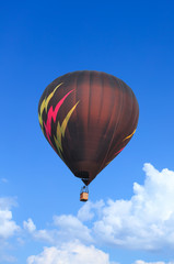 Fototapeta premium Colorful Hot Air Balloons in Flight over blue sky