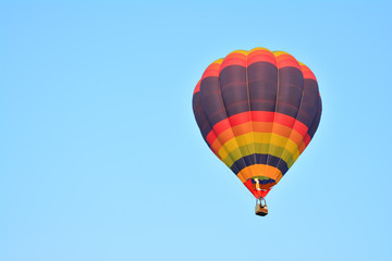 Colorful Hot Air Balloons in Flight over blue sky