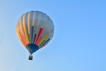 Colorful Hot Air Balloons in Flight over blue sky