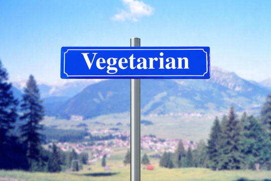 Vegetarian On Blue Street Sign With Landscape